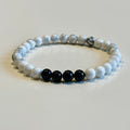 Elastiskt armband med magnesit och onyx 6mm