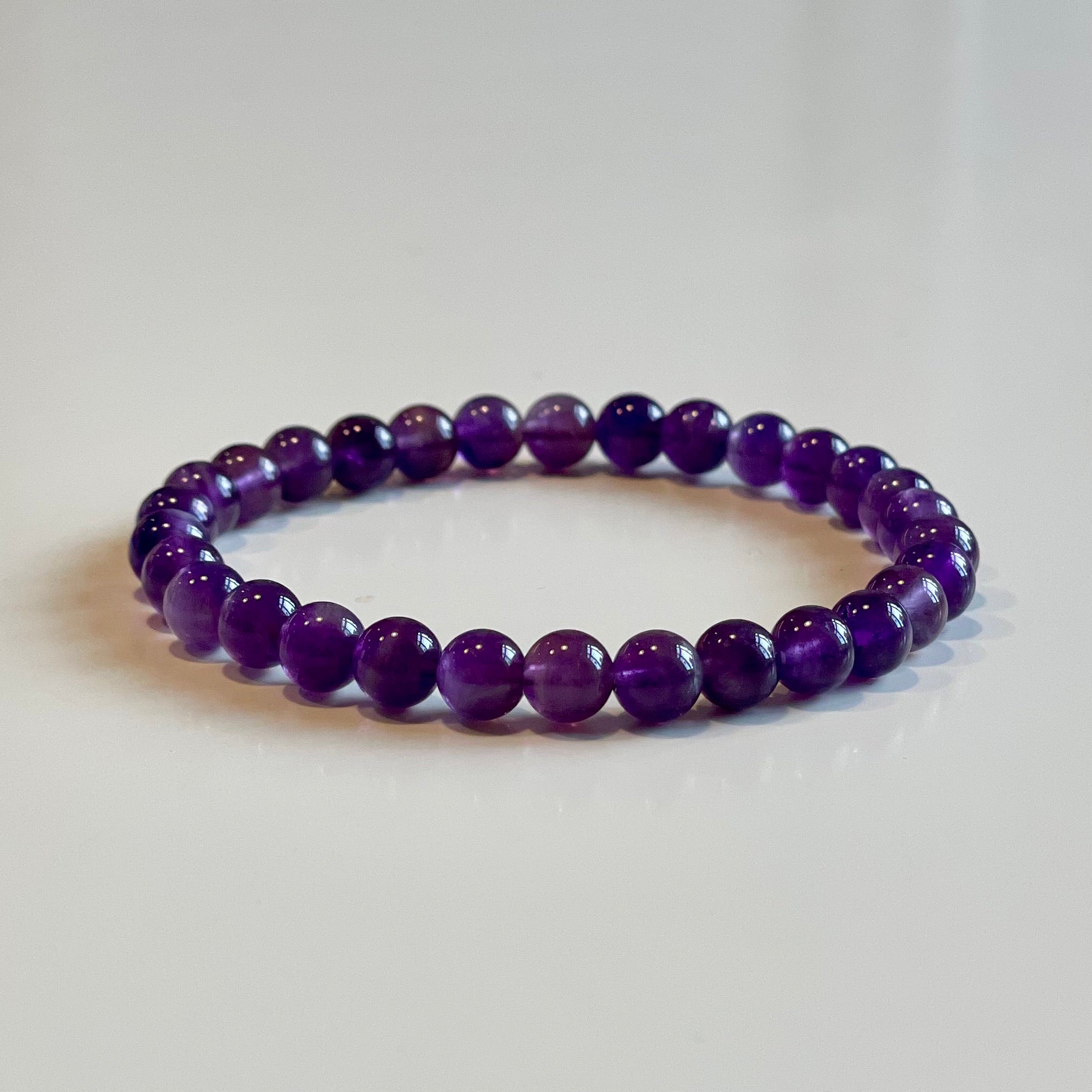 Elastiskt armband med ametist 6mm